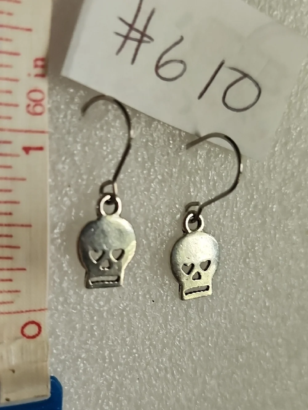 Hand Crafted Silver Skull Earrings with Heart Eye Cutouts